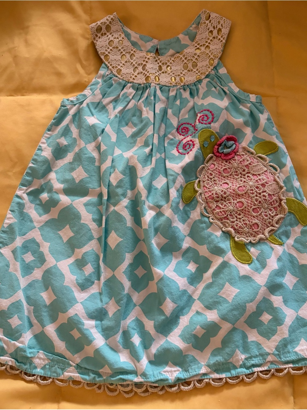 Mud Pie Aqua and White Geo Print Sleeveless Dress with Crochet Turtle Applique